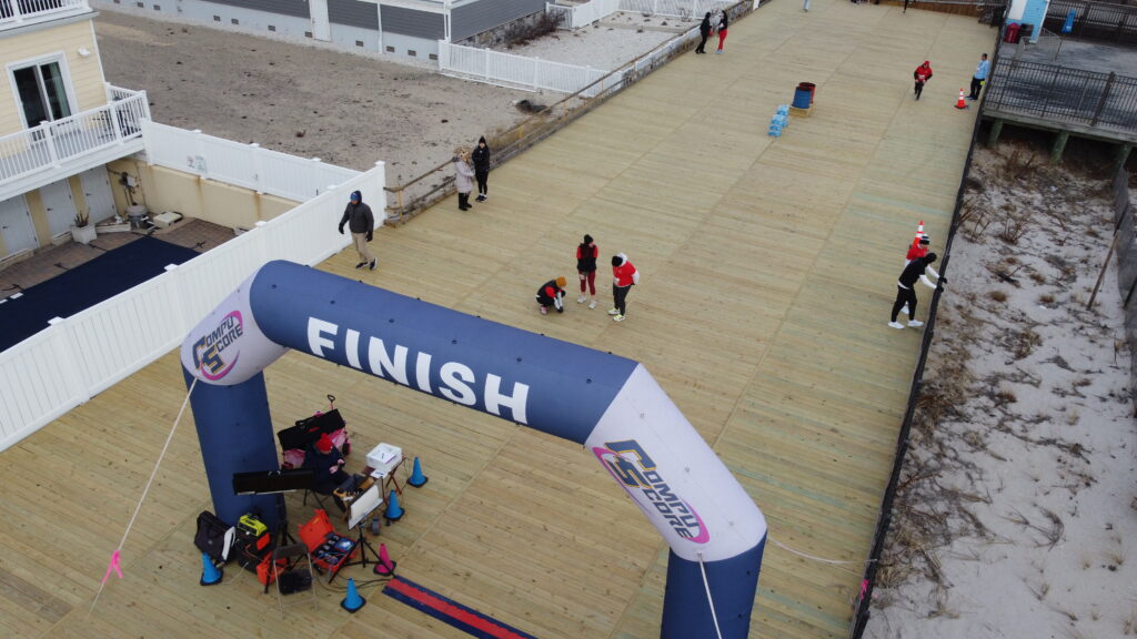 Runners on a boardwalk in Seaside Heights, NJ